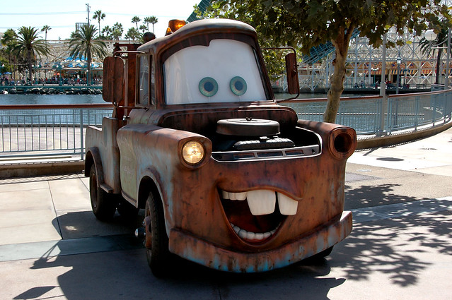 The character Tow Mater from Cars hangs out of the Performance Corridor near