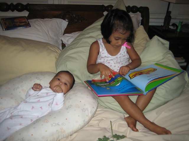 Soph reads to Lily