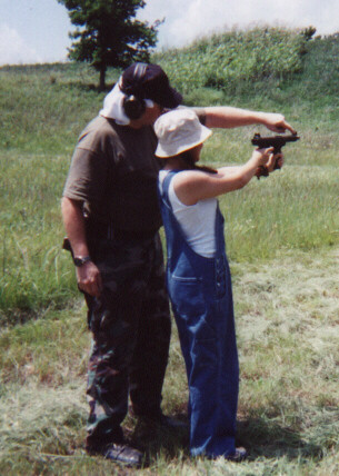 Dad B shows me how to aim the Tech-9..
