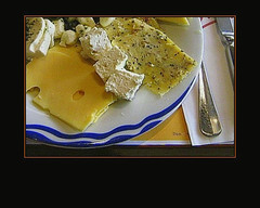 Cheese.                Cheese Board (Plate of Cheeses)