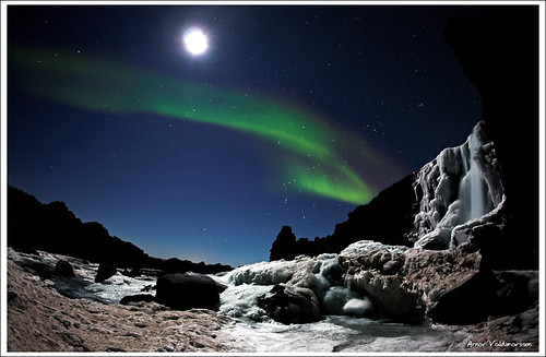 Moonshimmering waterfall and Aurora Borealis