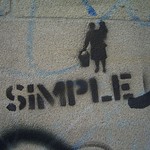 A photo of some graffiti saying "SIMPLE"