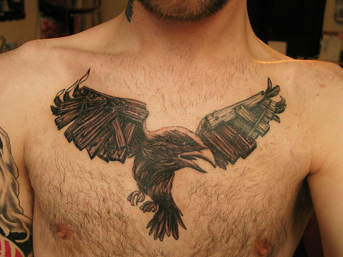 Crow tattoo on chest
