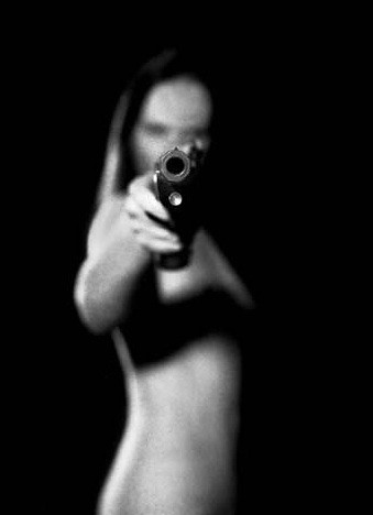 Nude with gun