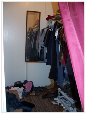 The before picture of the walk-in closet