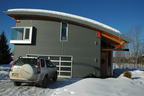 Modern Alaskan House overlooking Lake Otis, after a recent snow during breakup, Anchorage, Alaska, USA by Wonderlane