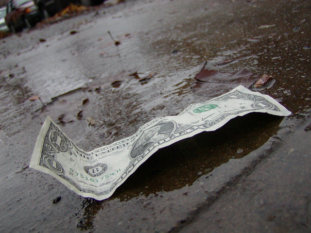 Dollar wet ground