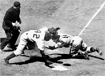 Jackie Robinson stealing home plate for the Brooklyn Dodgers. 2007 represents the 60th anniversary of the integration of Major League Baseball. This resulted from a civil rights campaign involving the NAACP, Paul Robeson and many others. by Pan-African News Wire File Photos