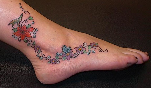 An ArtNBody foot tattoo by Bob Bieber