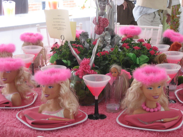 Bad Barbies were planted in the mini rose bushes Breaking from the plastic