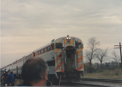 Chartered fantrip C&NW /Metra commuter train backing up for another photo runby. Photographed on Saturday, October 28th  1989 during the C&NW /Metra EMD E-8 Last Run fantrip from Chicago to Harvard Illinois. by Eddie from Chicago