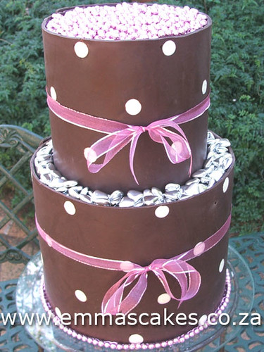 2 Tier tall wedding cake with dark chocolate polkadot band collars around
