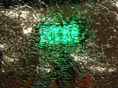 ATM Through Rainy Window