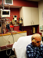 elderly man in hospital bed