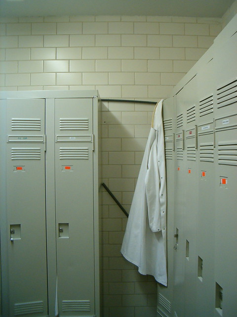 Locker room with lonely lab coat