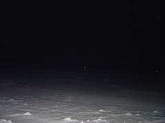 Flashing illuminating snow on the ice