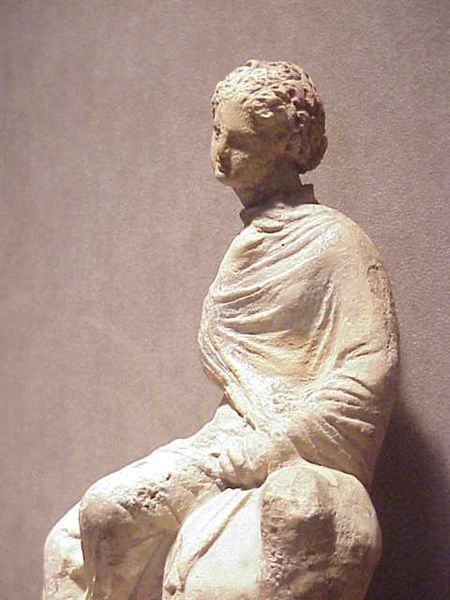 Terracotta figurine of a Seated Maiden with "Melon" Hairstyle Greek 230 BCE