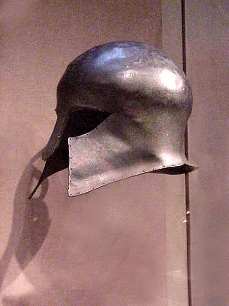 Greek Corinithian-style bronze helmet that has been "killed" 700-500 BCE