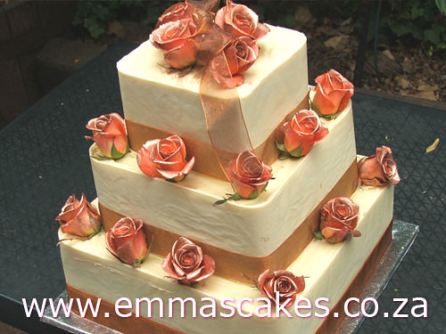 square wedding cake with white chocolate bands with rounded corners the 