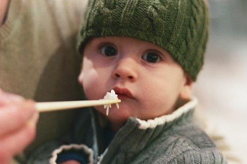 Baby eating rice