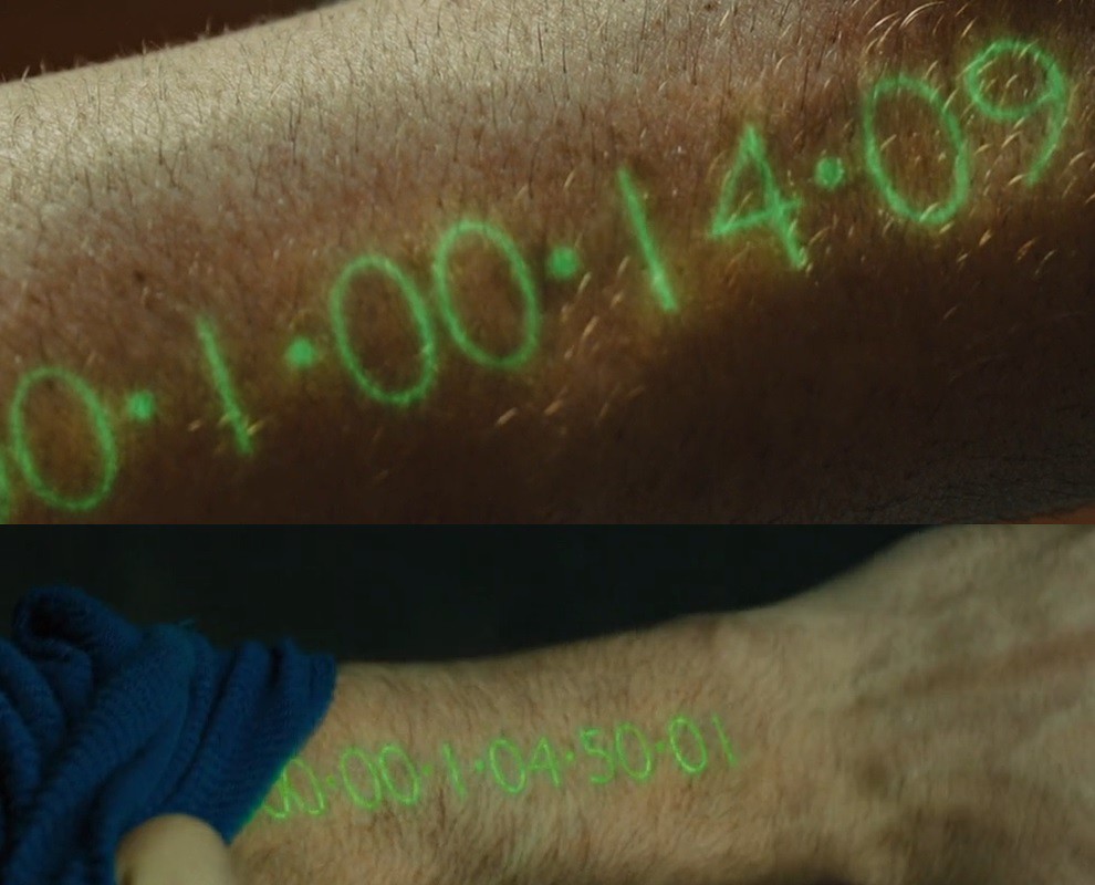 in time movie clock on arm