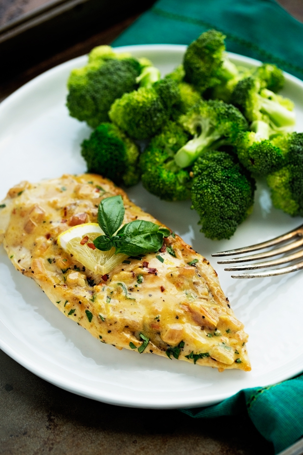 plate with steamed broccoli and chicken with lemon garlic cream sauce