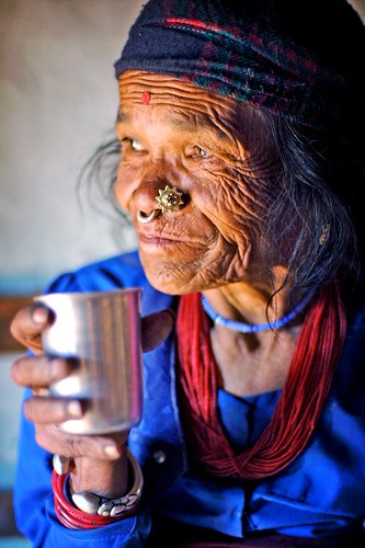 old tamang woman drinking tea
