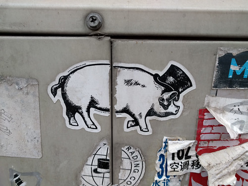 a pig in a top hat