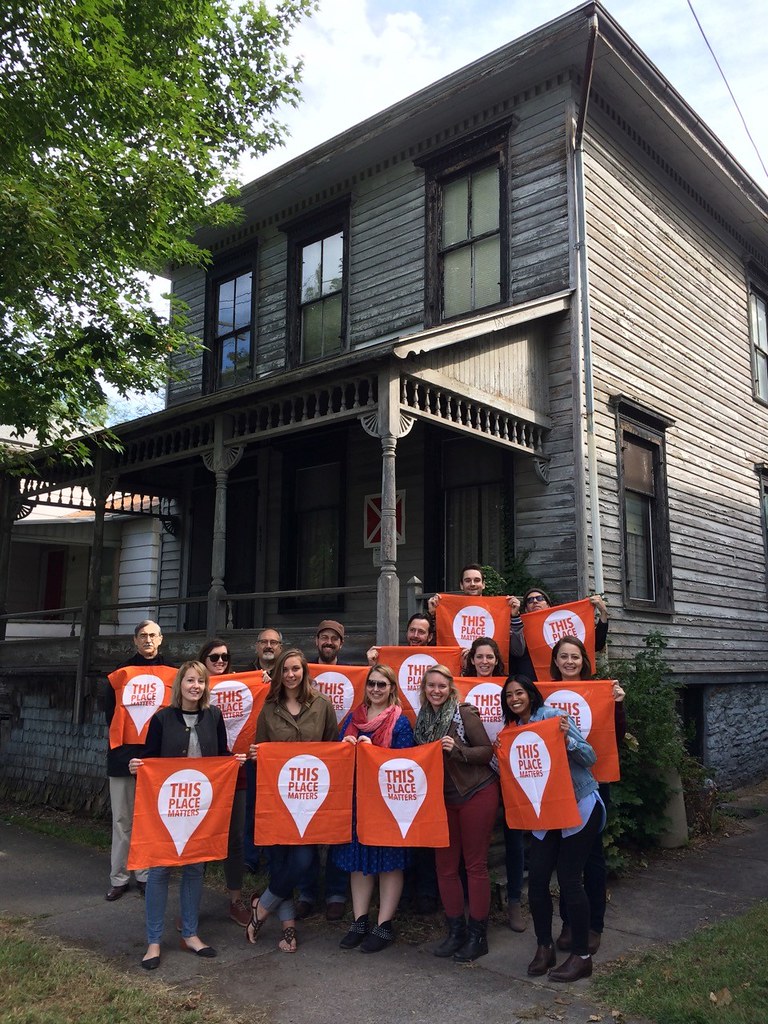 HPP students with CRP professors Michael Tomlan and Jeffrey Chusid in front of the Dennis Newton house in Ithaca, the site of the first African American fraternity in the United States. 