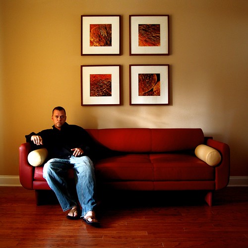 red sofa. by D.James | Darren J. Ryan