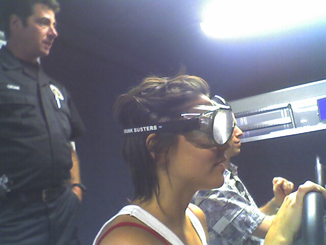 Merci wearing Drunk Busters glasses during a driving simulator