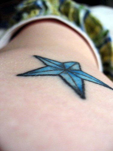 Home Stars rib tattoo