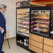 Secretary Kerry Considers His Options as he Prepares to Buy Hometown Dunkin' Donuts in the State Department Cafeteria by U.S. Department of State