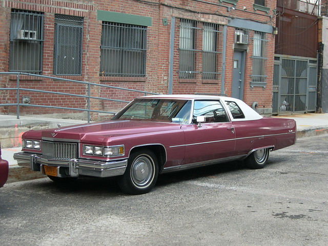A 1970s vintage Cadillac complete with a set of classic orange New York 