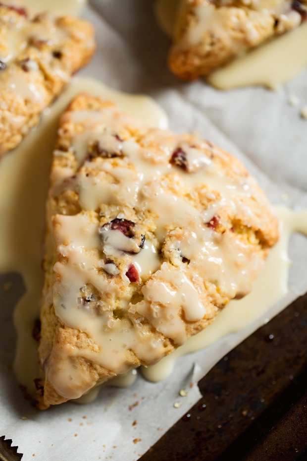 Cranberry Orange Scones with Pistachios - these scones are tender and flakey. The pistachios add such a nice nuttiness and crunch! #orangescones #pistachioscones #cranberryorangescones #scones | Littlespicejar.com