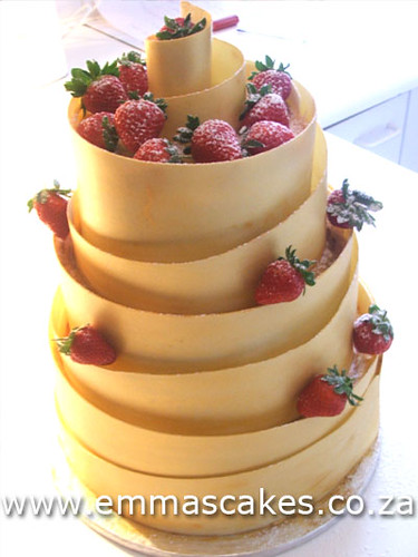 Gold spiral wedding cake 3 Tier wedding cake with white chocolate collars