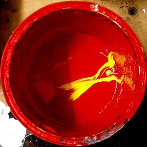 Red Paint with Splash of Yellow