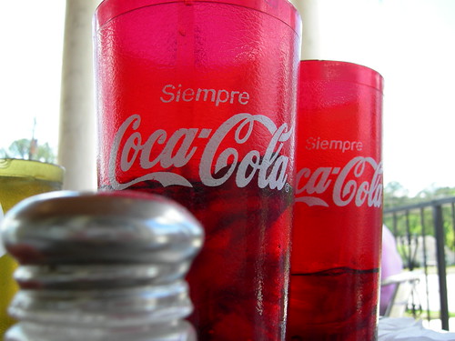 road perspective coke cocacola logos