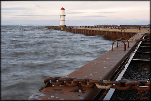longexposure lighthouse sunrise pier rust rusty chain link outofcamera