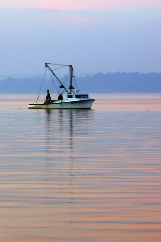 reflection water sunrise boats