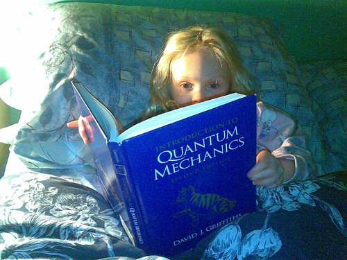 Mira reading the Griffiths Quantum Text