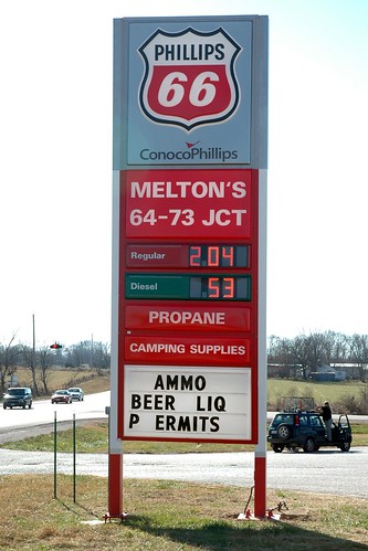 red sign advertising ammo phillips66 meltons