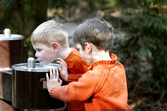 ian and nick taking turns at the drinking fountain  … 