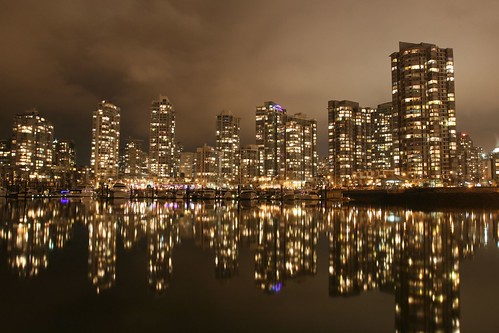 world ocean city travel sea sky urban canada reflection building tower water beautiful rain skyline architecture modern night vancouver clouds skyscraper marina canon reflections landscape gold lights golden design living cosmopolitan downtown glow cityscape waterfront apartment skyscrapers pacific metro britishcolumbia postcard magic famous dream lifestyle forbes international condo coastal future highrise yaletown falsecreek northamerica metropolis glowing olympic residential magical westcoast metropolitan canonef1740mmf4lusm condominium pictureperfect 2010 olympicgames concordpacific downtownvancouver thesource fullheart cotcmostinteresting olympiccity impressedbeauty travelerphotos reflectyourworld