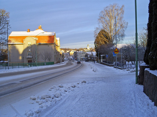 road winter sky snow building sweden Åmål