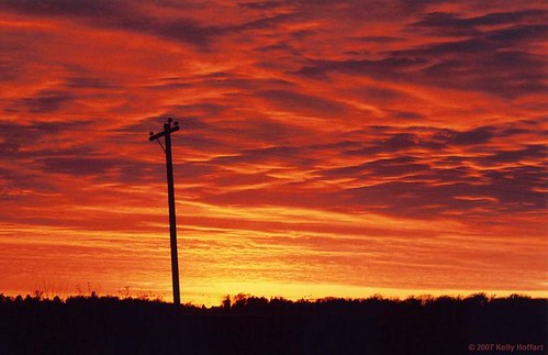 sunset red orange field yellow rural nebraska edgar telephonepole yashica fx7 fineartphotography edgarnebraska kellyhoffart yashicafx7super