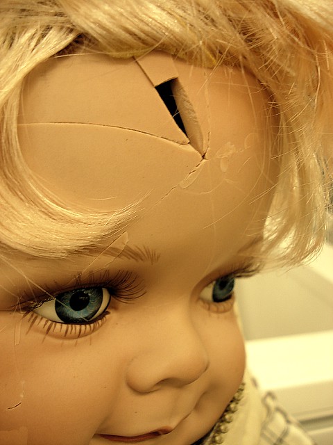 doll with cracked head