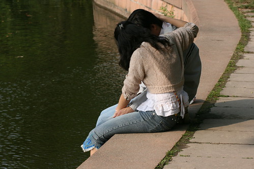 Lovers Sitting by the Water