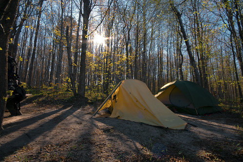 travel mi sunrise tents hiking michigan lifestyle editorial sunburst backpacker campsite ttk longshadows jordanriverpathway puremichigan