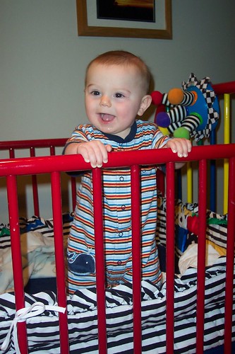 standing up in his crib!